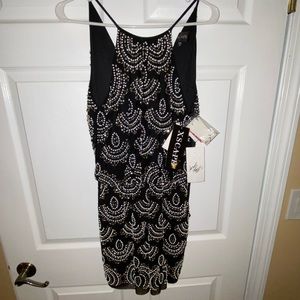 Xscape black and beaded dress. NWT